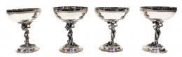 947 - CONJUNTO DE 12 COPAS EN METAL PLATEADO