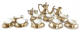 783 - JUEGO DE CAFÉ EN PLATA Y TRES TAZAS CON SU PLATO