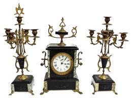 869 - RELOJ CON GUARNICIÓN. FINALES DEL SIGLO XIX