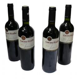 1102 - CUATRO BOTELLAS DE VINO