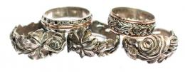 143 - LOTE DE ANILLOS FLORALES EN PLATA