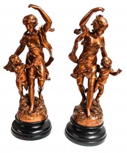 926 - PAREJA DE FIGURAS EN CALAMINA. FINALES DEL SIGLO XIX