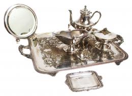 991 - CONJUNTO DE PIEZAS EN METAL PLATEADO