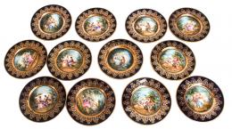 466 - COLECCIÓN DE DOCE LATOS DE PORCELANA AUSTRÍACA