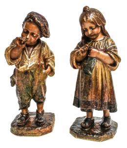930 - PAREJA DE FIGURAS EN ESTUCO  PPS. DEL S.XX