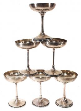 784 - CONJUNTO DE SIETE  COPAS EN PLATA