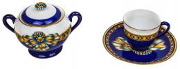594 - CONJUNTO DE AZUCARERO Y TAZA EN PORCELANA HERMES