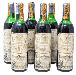 1023 - SEIS BOTELLAS DE VINO