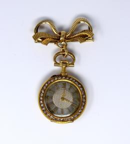 87 - BROCHE COLGANTE CON RELOJ DE BOLSILLO