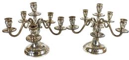 714 - PAREJA DE CANDELABROS EN PLATA DEL SEGUNDO TERCIO S.XX