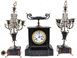 669 - RELOJ CON GUARNICIÓN FRANCÉS DE FINALES S.XIX