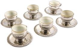 735 - SEIS TAZAS CON PLATO EN PLATA DE LA SEGUNDA MITAD S.XX