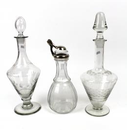 69 - TRES BOTELLAS DE CRISTAL
