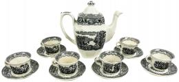 464 - CONJUNTO DE SEIS TAZAS Y CAFETERA EN LOZA