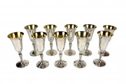 703 - CONJUTO DE 12 COPAS DE CAVA EN PLATA