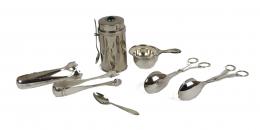 671 - CONJUNTO DE PIEZAS EN PLATA Y METAL