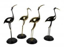 791 - CUATRO FIGURAS DECORATIVAS EN METAL ÚLTIMO CUARTO DEL S.XX