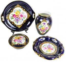422 - CONJUNTO DE CUATRO PIEZAS EN PORCELANA "HUTSCHENREUTHER"