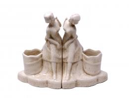 854 - PAREJA DE APOYA LIBROS EN CERAMICA