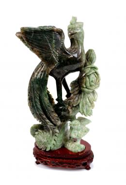 423 - FIGURA ORIENTAL EN PIEDRA DURA TALLADA.