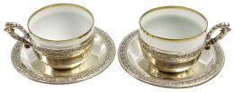 828 - PAREJA DE TAZAS CON PLATOS DE MEDIADOS DE SIGLO XX