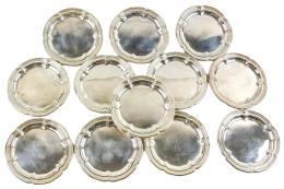 692 - CONJUNTO DE 12 PLATOS DE PAN EN PLATA 