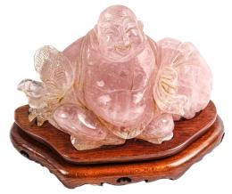 429 - FIGURA ORIENTAL EN CUARZO ROSA DEL ÚLTIMO CUARTO DEL S.XX