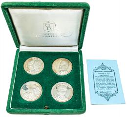 416 - CUATRO MEDALLAS CONMEMORATIVAS DE PLATA