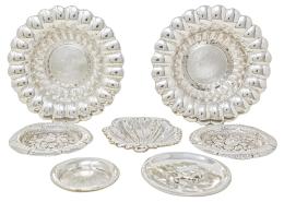 667 - COLECCIÓN DE SIETE CENTRITOS DE PLATA