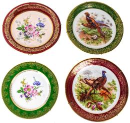 457 - CUATRO PLATOS EN PORCELANA DE LIMOGES