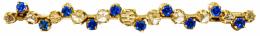 67 - BROCHE CON DIAMANTES Y ZAFIROS DE PPS. DEL S.XX