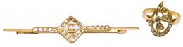 95 - BROCHE Y SORTIJA DE PPS. DEL S.XX