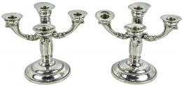 748 - PAREJA DE CANDELABROS DE PLATA DE MEDIADOS DEL S.XX