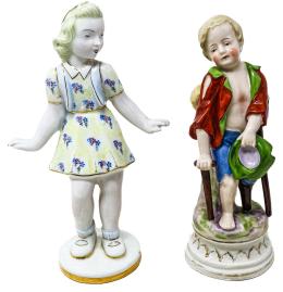 872  -  DOS FIGURITAS EN PORCELANA DE MEDIADOS DE S. XX