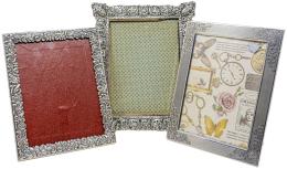 761 - TRES MARCOS DE PLATA VARIADOS