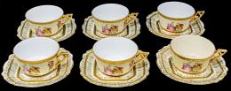 518  -  COLECCIÓN DE SEIS TAZAS DE PORCELANA