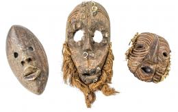 401 - TRES MÁSCARAS AFRICANAS DE MEDIADOS DEL S.XX