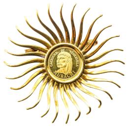 63  -  BROCHE SOL CON MONEDA