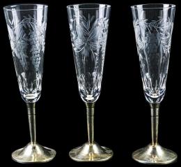 83  -  TRES COPAS DE CAVA CON PIE DE PLATA