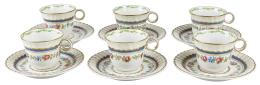 527 - JUEGO DE SEIS TAZAS CON PLATO DE LIMOGES DE MEDIADOS S.XX