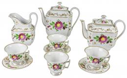 507  -  CAFETERA, TETERA Y LECHERA DE PORCELANA