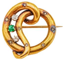 84  -  BROCHE NUDO CON DIAMANTES Y ESMERALDA DEL S.XIX