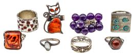 148  -  OCHO ANILLOS DE PLATA