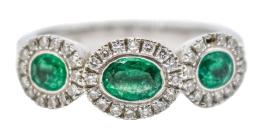 81  -  ANILLO CON ESMERALDAS Y BRILLANTES