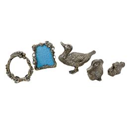 973  -  MARQUITOS Y TRES FIGURITAS DEL ÚLTIMO CUARTO DEL S.XX