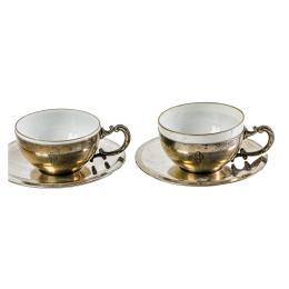 744  -  PAREJA DE TAZAS CON PLATO DEL PRIMER TERCIO DE SIGLO XX