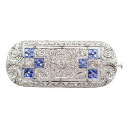 75  -  BROCHE CON DIAMANTES DE MEDIADOS S.XX