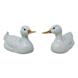 676  -  PAREJA DE PATOS EN PORCELANA DE LOS AÑOS 70