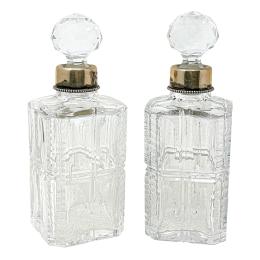 57  -  PAREJA DE BOTELLAS LICORERAS DE MEDIADOS S.XX