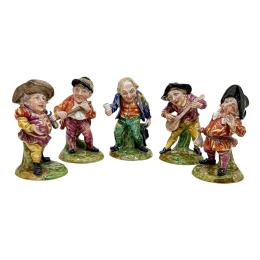 483 - CONJUNTO DE FIGURAS DE PORCELANA “MÚSICOS”. SIGLO XX